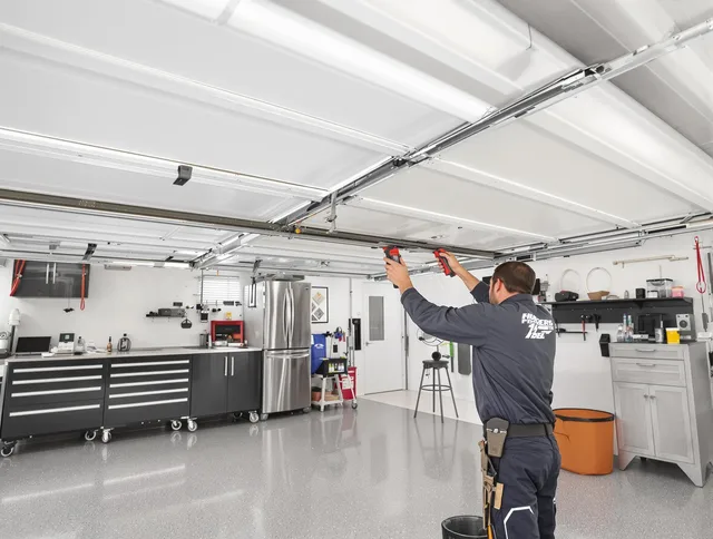 Overhead garage door repair service by Town 'n' Country Garage Door Repair in Town 'n' Country