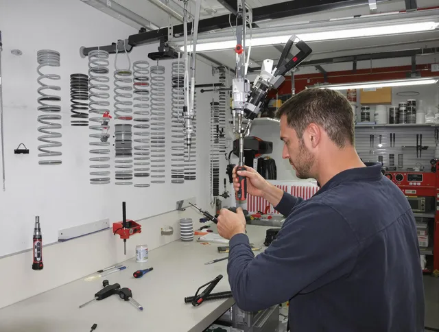 Town 'n' Country Garage Door Repair safety certified technician performing precision spring replacement in Town 'n' Country